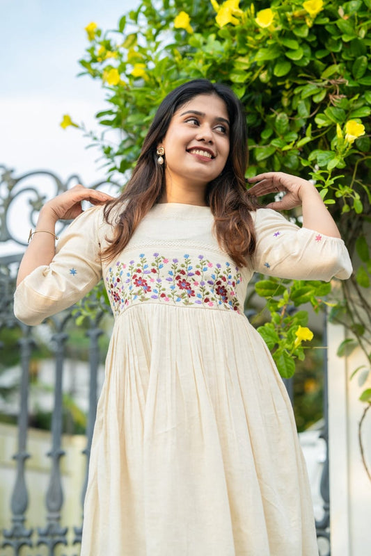 Off-white cotton dress with floral embroidery kurti