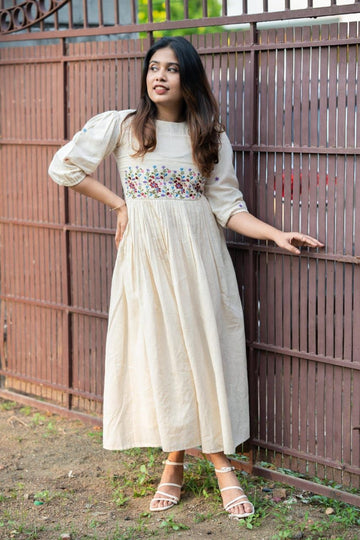 Off-white cotton dress with floral embroidery kurti
